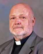 Father John E. Collins, CSP