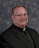 Father David E. Farnum, CSP